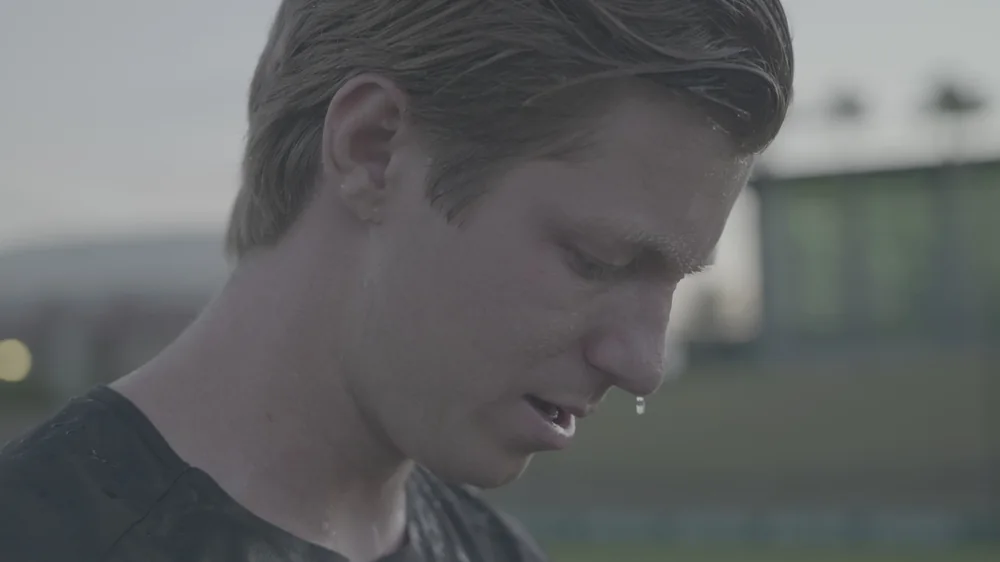 Mathis, syp co-founder, drenched in sweat and catching his breath during training